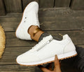 Women's flat shoes in champagne, grey and white with an artificial PU upper and rubber sole.