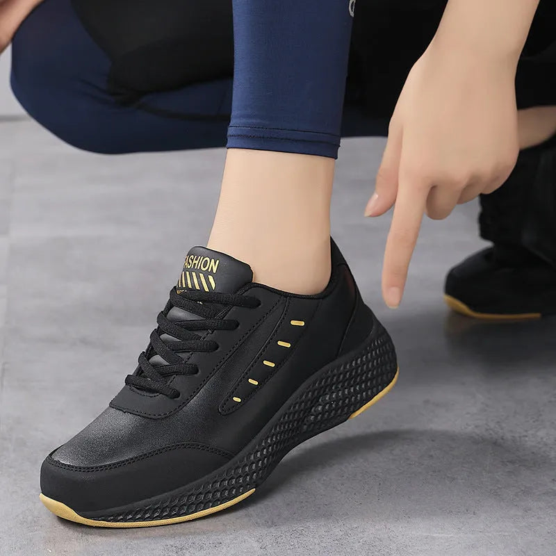 Women's PU leather casual sneakers with round toe and flat heel, solid colour low top design