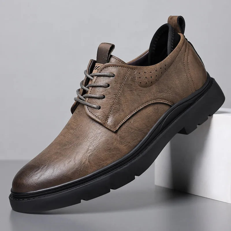 Men's black leather shoes with visible stitching on a two-layer cowhide upper and a rubber sole.