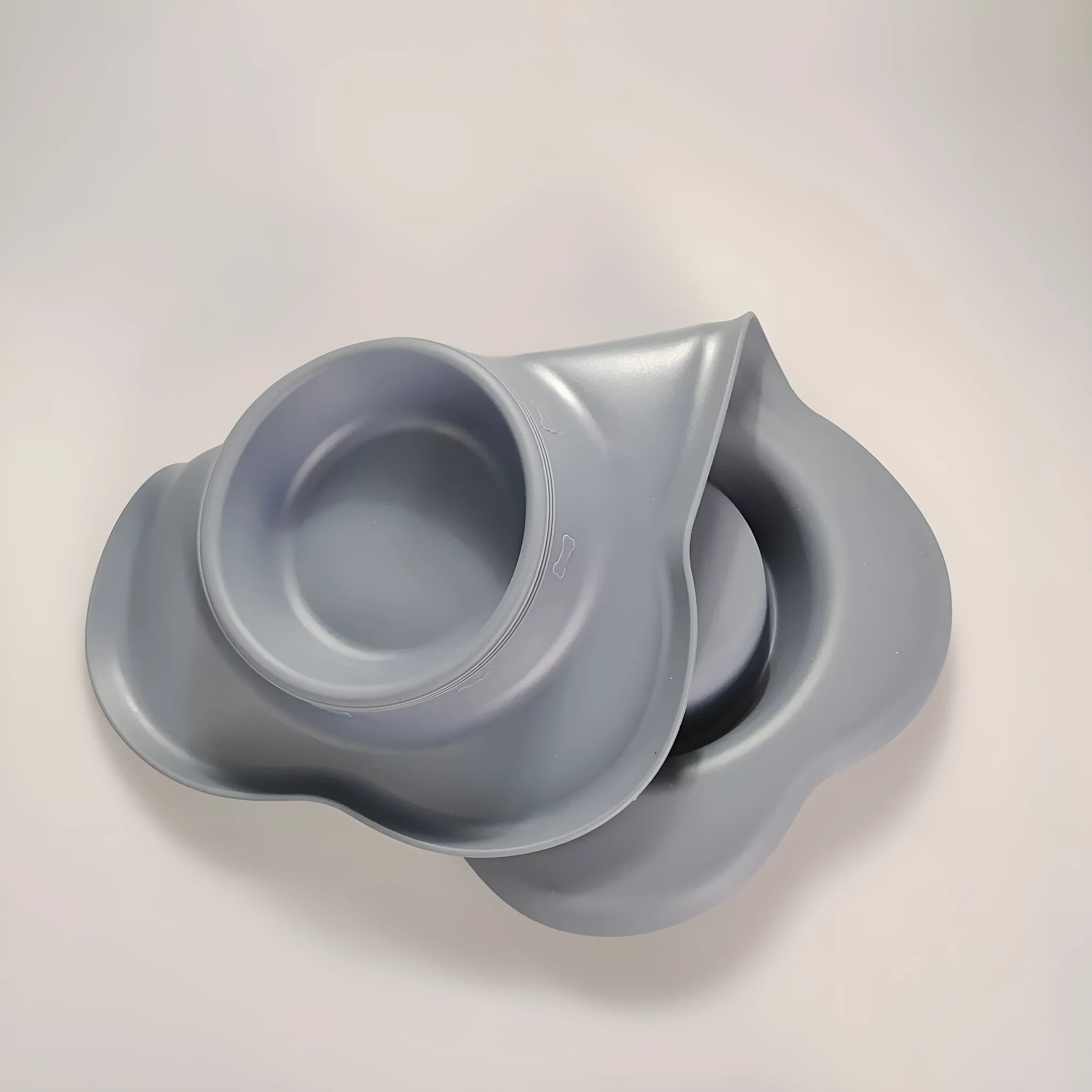 Large silicone pet feeding mat with two stainless steel bowls in silver grey colour