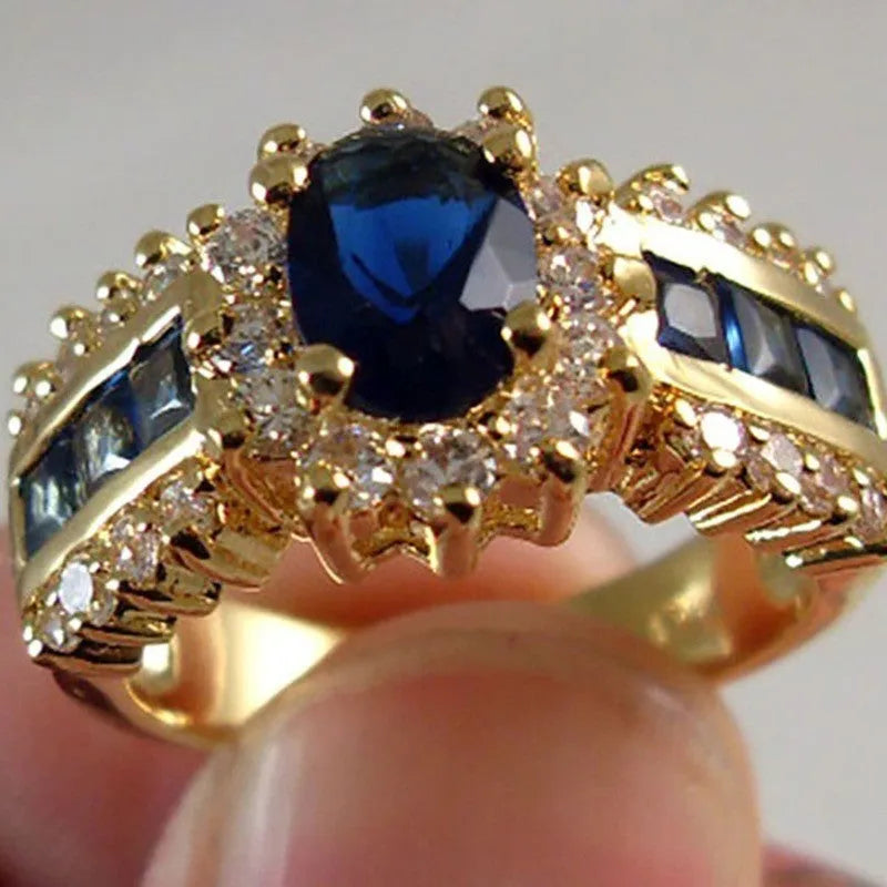 Personalised zinc alloy fashion ring with diamond and zircon details in blue and purple.