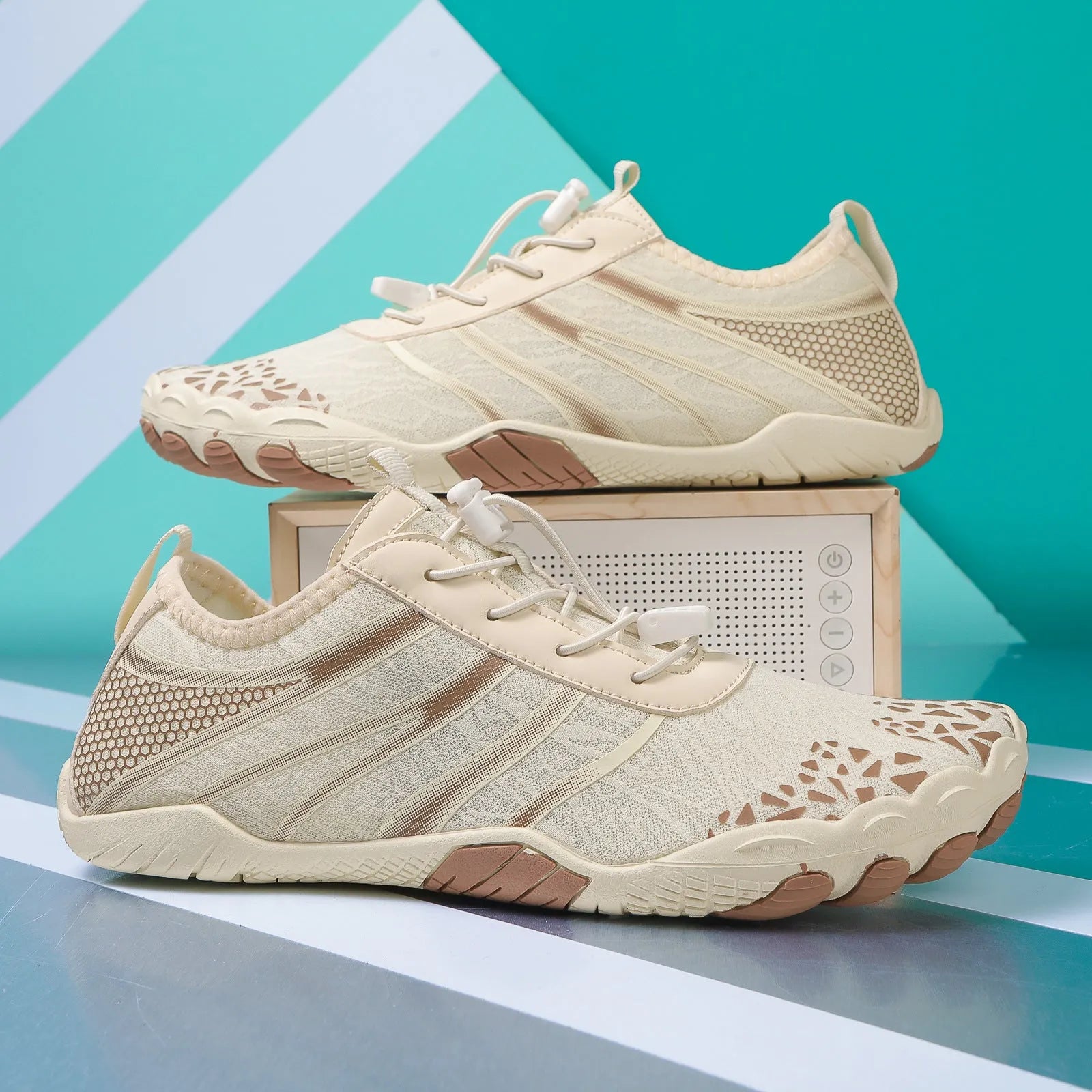 Beach running shoes with Lycra stretch fabric upper shown in multiple colours including beige and white pink.