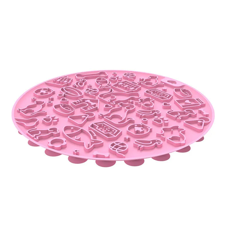 Round silicone pet licking mat with suction cup in blue colour on a floor