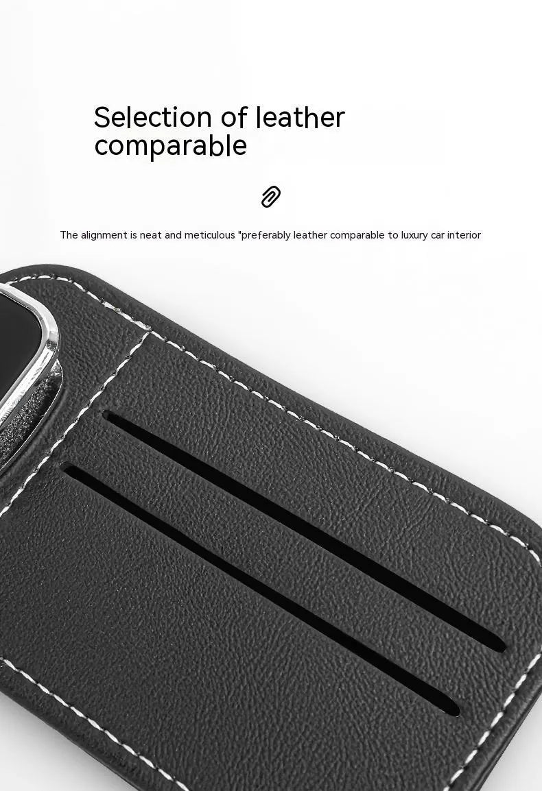 Beige first-layer cowhide leather card holder snapped onto a car's sun louver.