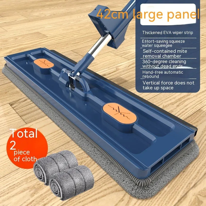Large flat mop with long stainless steel handle and blue cloth on hard floor