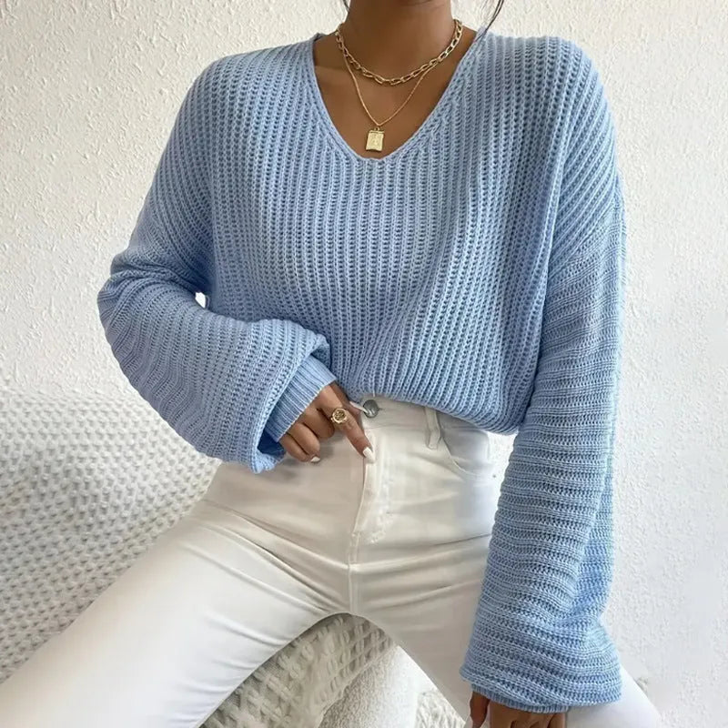 Women's long sleeve polyester pullover top in a solid colour with loose casual fit.