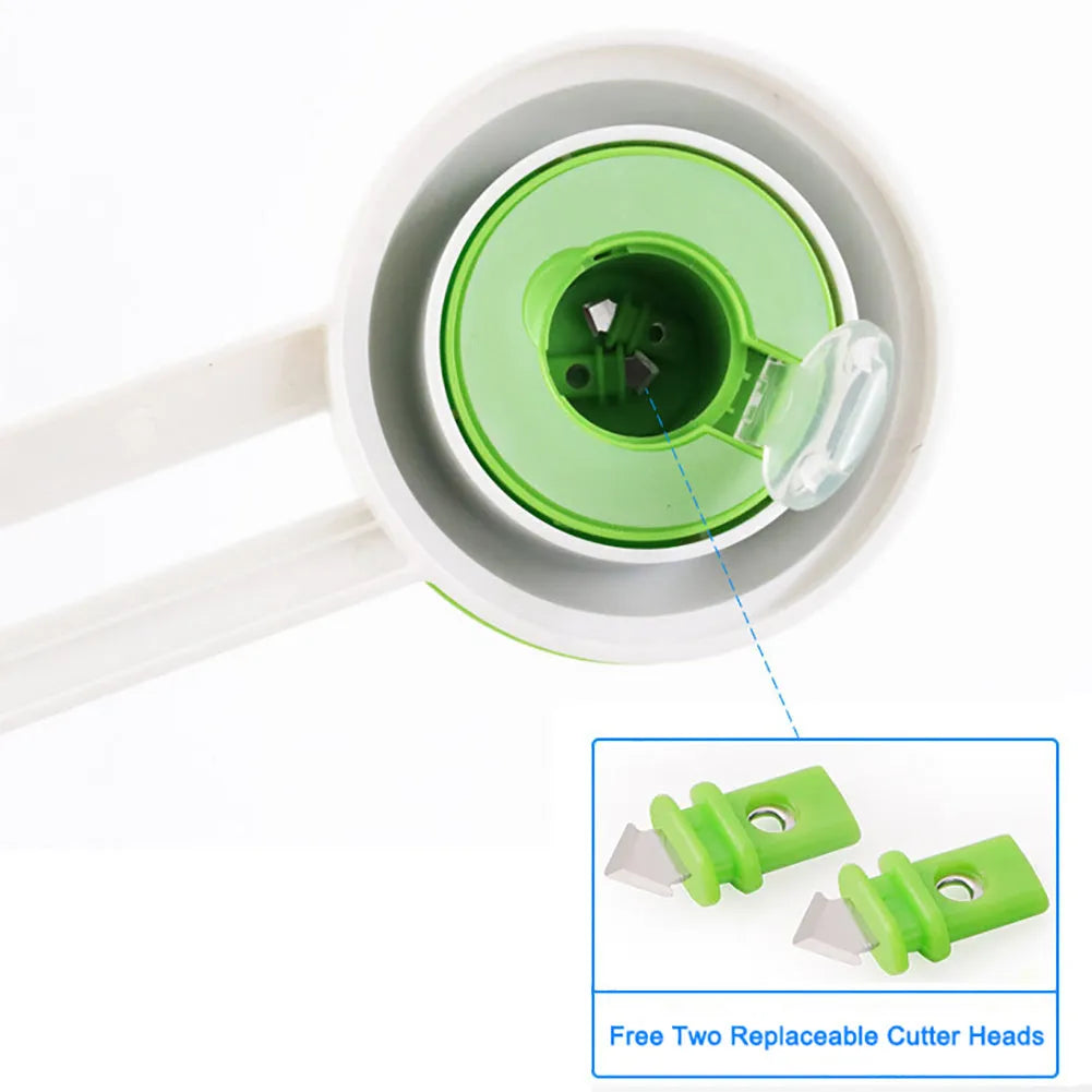 Orange or green plastic round paper cutter for A3 sheets on a colour box.
