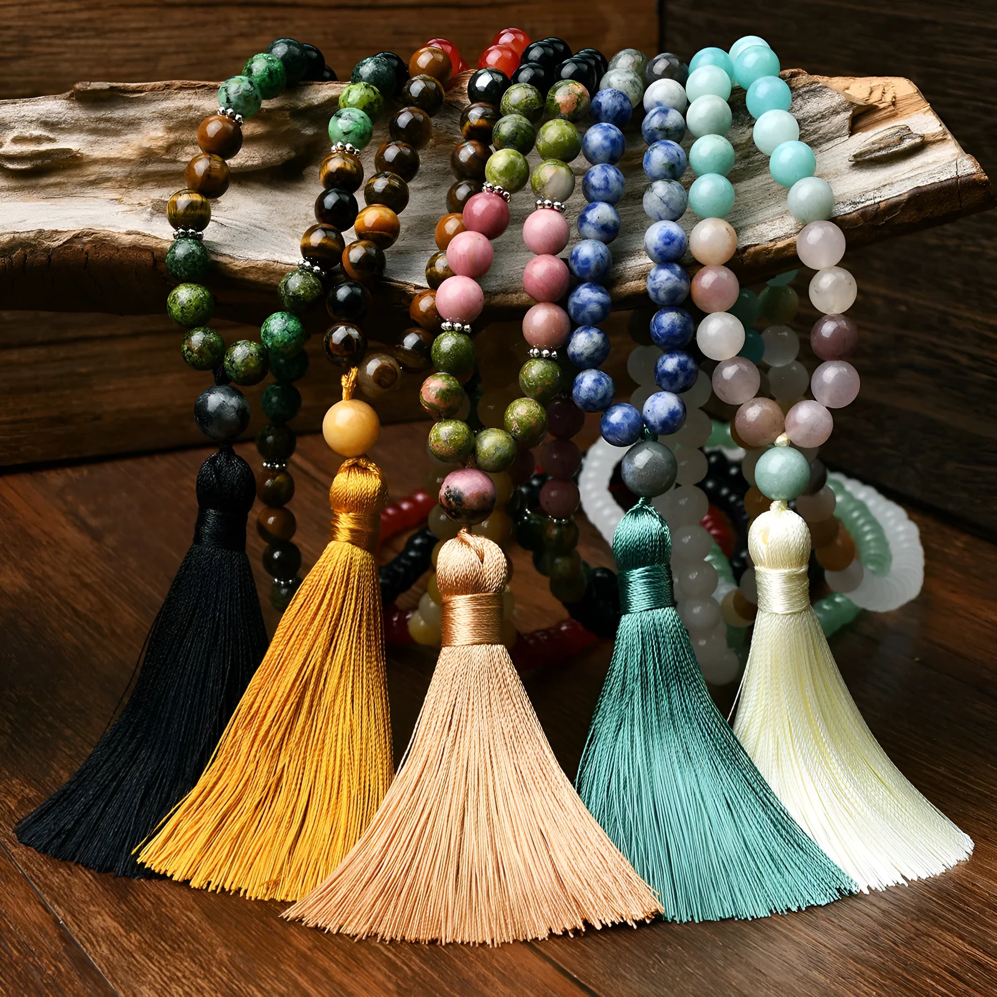 Long bohemian necklace with 108 stone tassels and a geometric gemstone pendant on an 81cm chain.