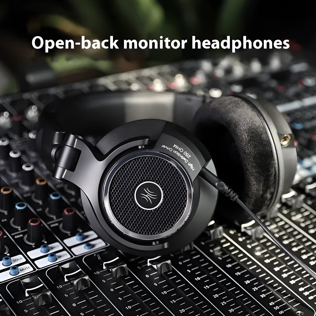 Wired noise reduction monitor headset with 40mm driver and dual 3.5mm/6.5mm plugs on black background