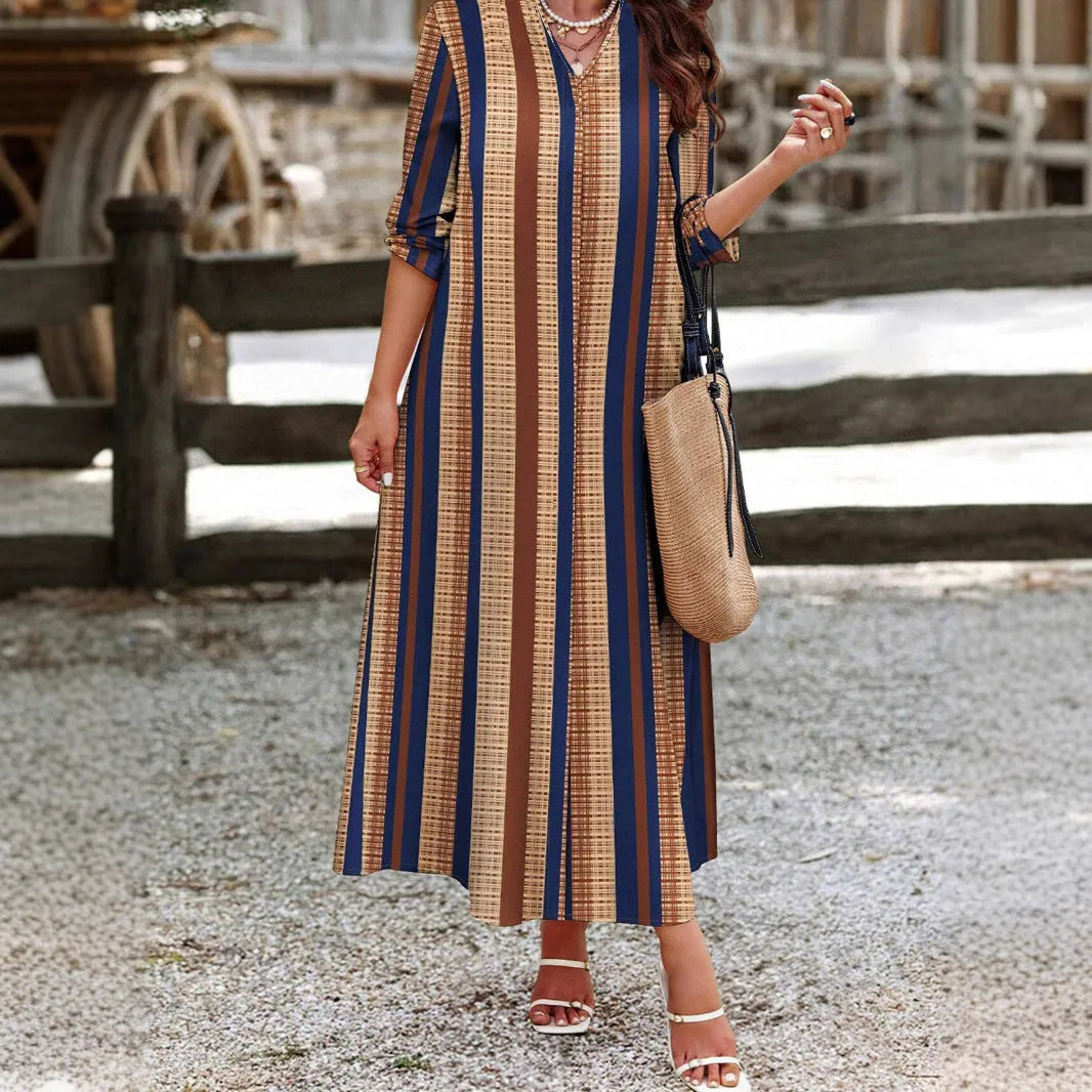 Women's camel coloured vertical striped V-neck knit dress with A-line silhouette and long sleeves