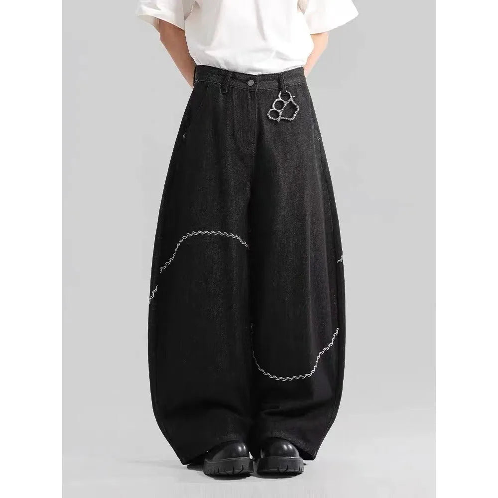Black straight-leg denim trousers with mid-waist design and zip fly closure