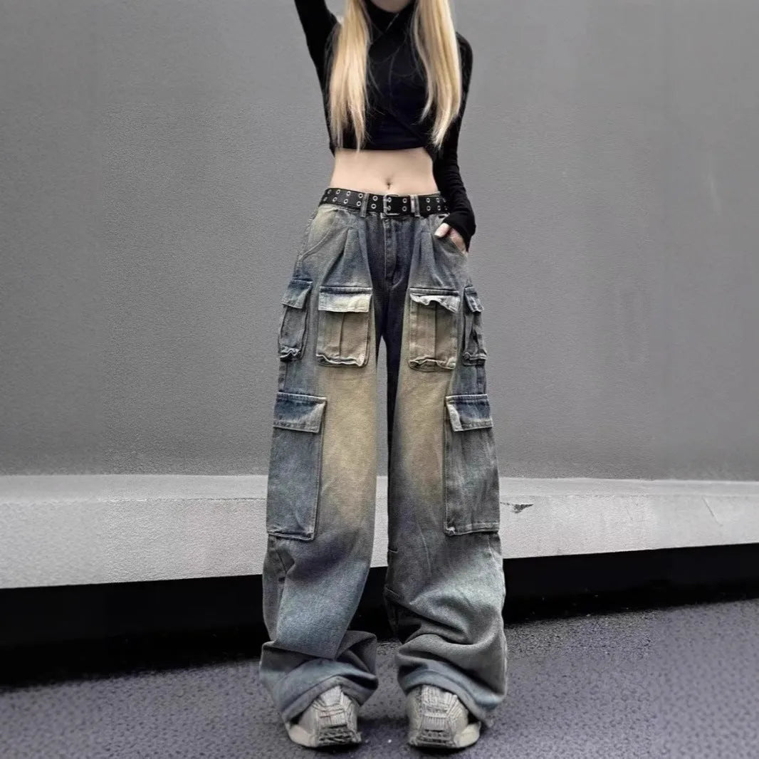 Multi-pocket loose distressed jeans in washed denim with straight-leg cut and tooling style pockets