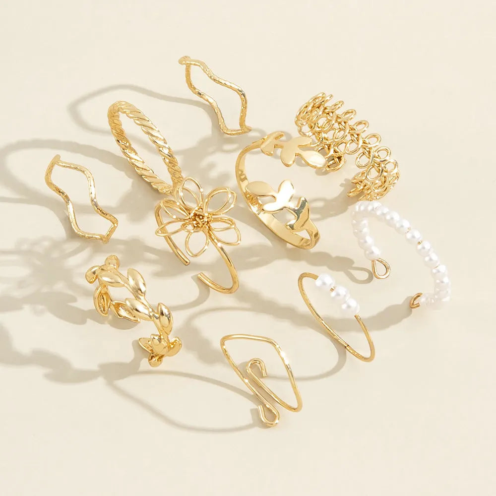 Women's gold openwork flower ring set with glossy electroplated finish