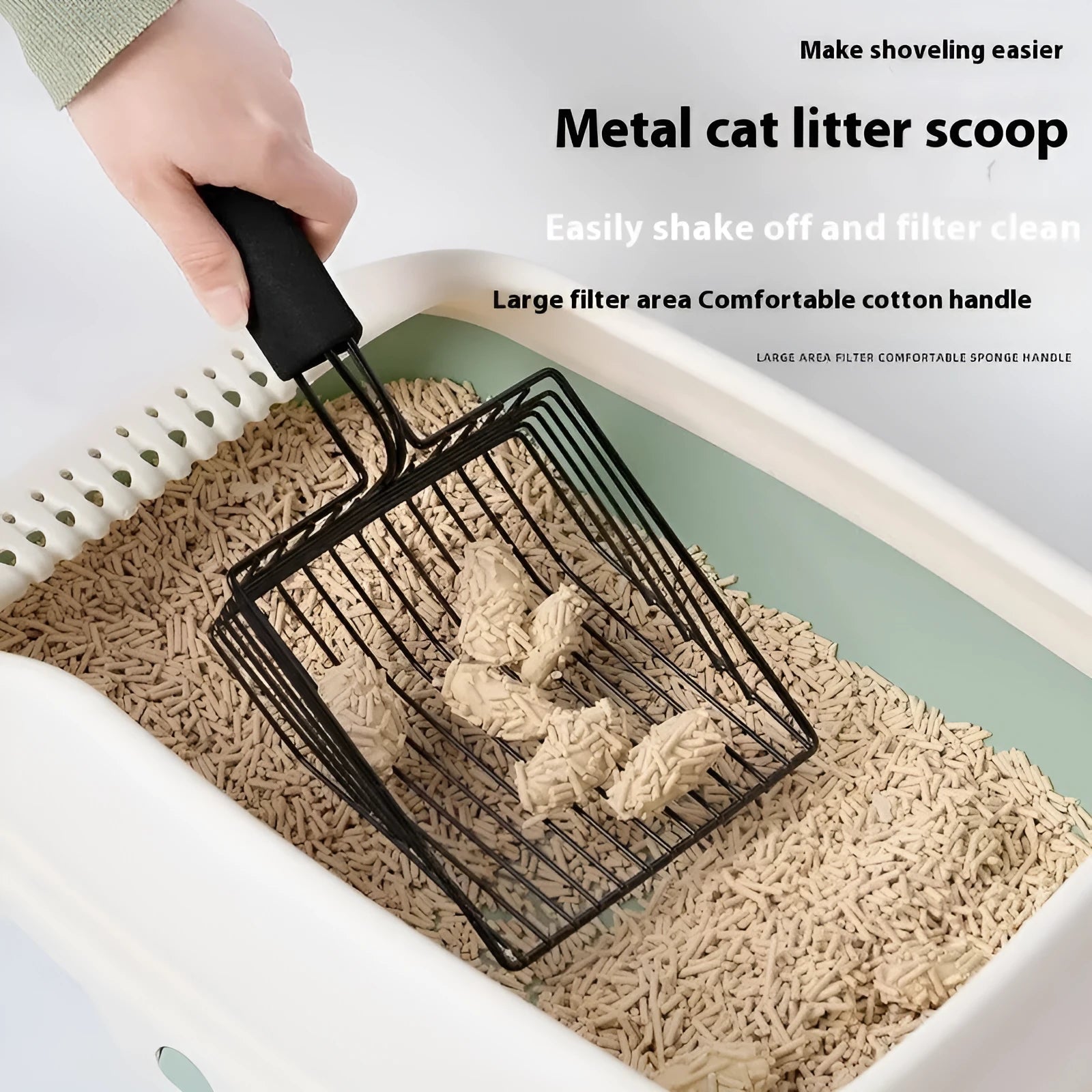 Black metal cat litter scoop with 0.8cm gap between tines for cleaning clumped litter
