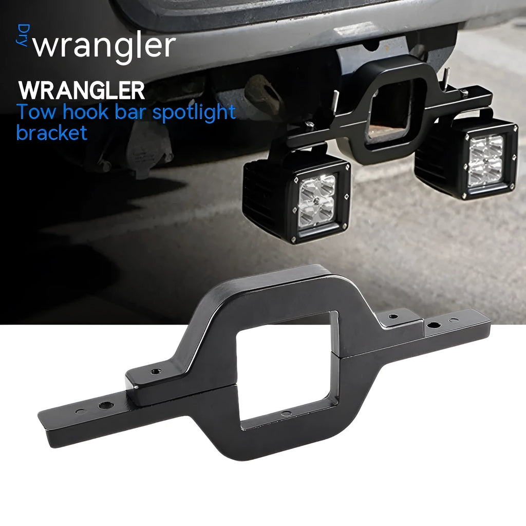 Black aluminium alloy LED reverse light mounting bracket for a Jeep Wrangler off-road vehicle.