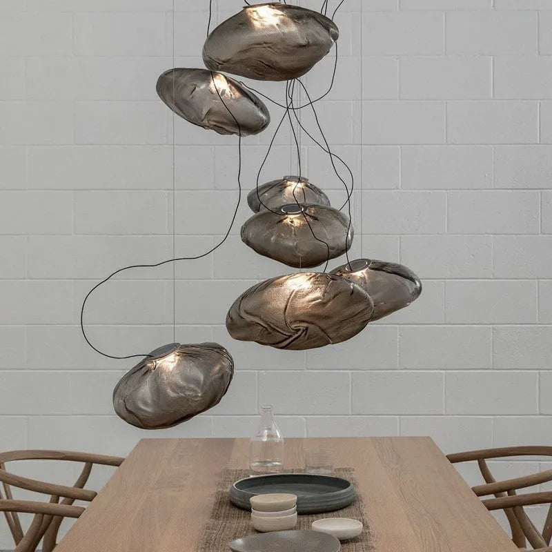 Modern minimalist glass chandelier with LED lighting in amber, clear, or smoke grey colour options