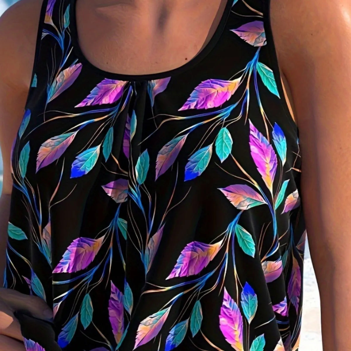 Women's split leaf design swimsuit set in a pure colour, showing top and shorts.