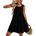 Women's loose-fitting sleeveless plaid dress with an oversized swing skirt on a hanger.