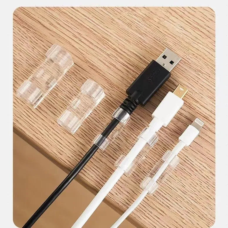 Transparent self-adhesive plastic cable management clips in a pack of 20 pieces.