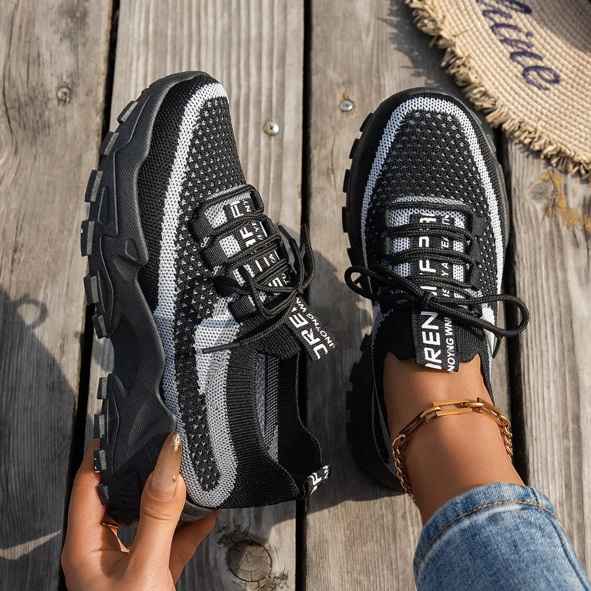 Women's Flyknit mesh lace-up sneakers in various colours with low flat heel and rubber sole