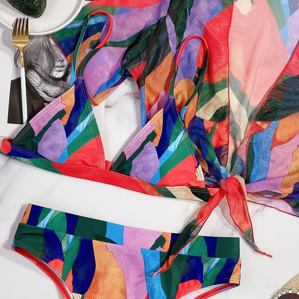 Red printed women's split swimsuit bikini for swimming and surf sports.