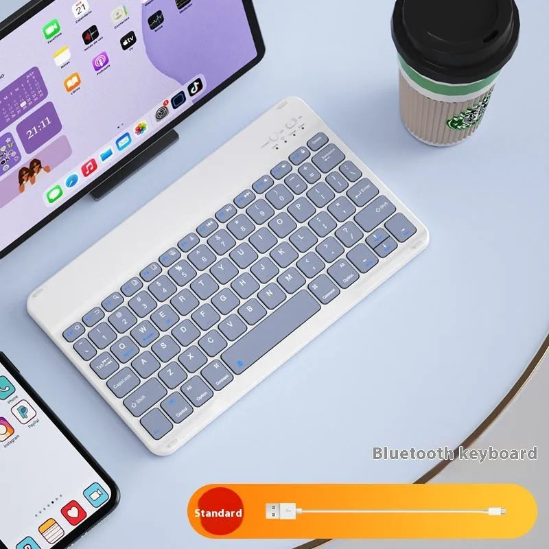 Bluetooth keyboard with rechargeable mouse in multiple colour options including white, green and pink