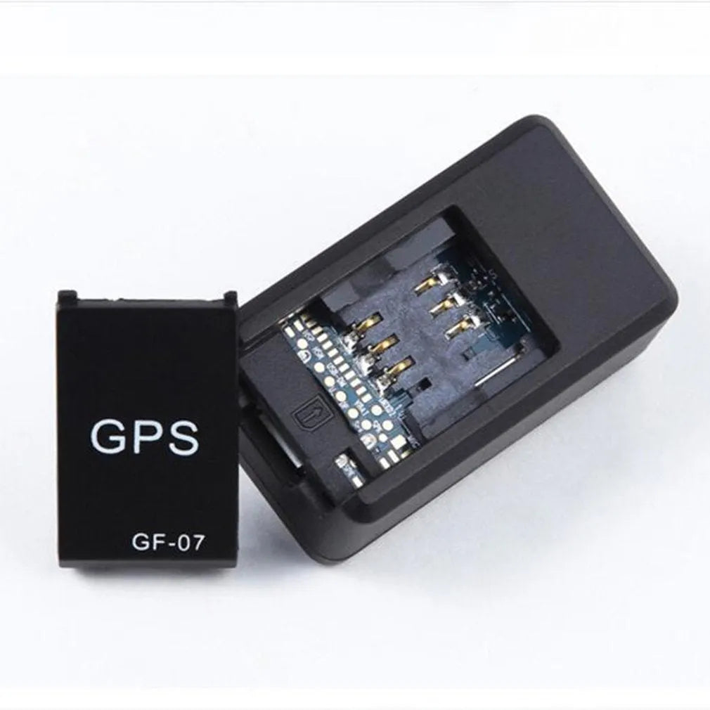 Black magnetic GPS car tracker device with compact rectangular design and USB charging port