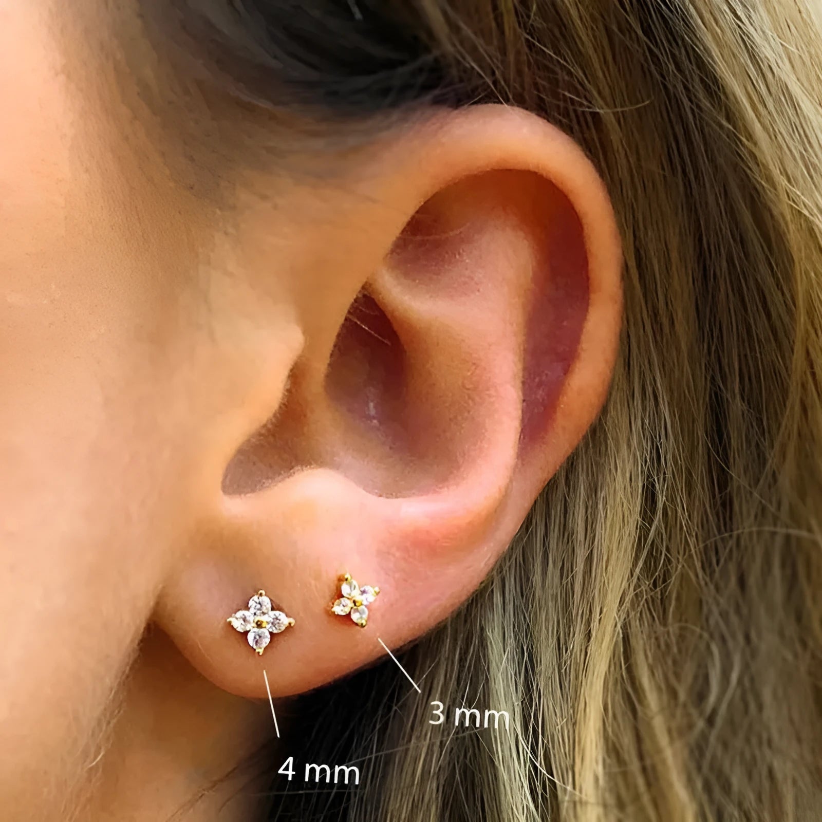 S925 sterling silver geometric flower stud earrings with crystal petals in gold or platinum finish.