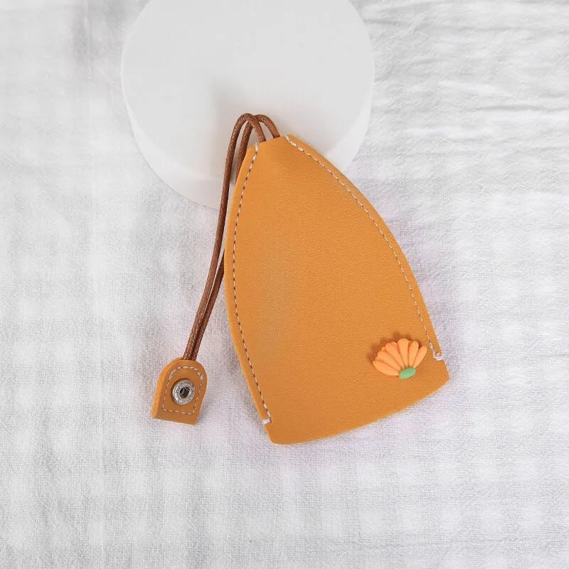 Cartoon style pull-out car key case made from PU leather in assorted designs