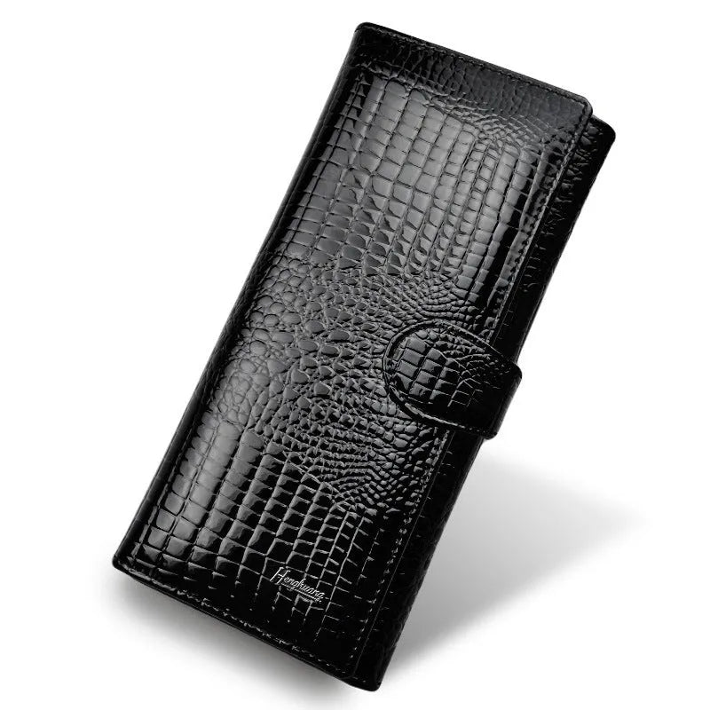 Women's red patent leather coin purse with a crocodile-embossed texture.