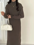 Knee-length acrylic knitted dress with half turtleneck collar and high-waist design