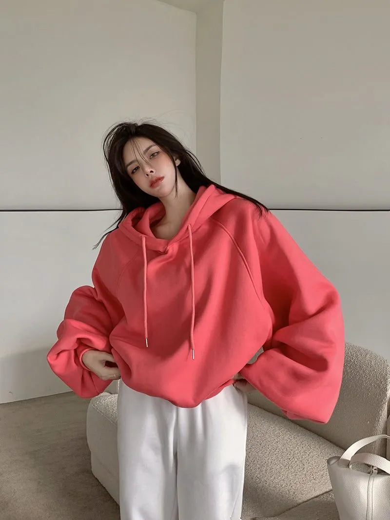 Women's loose mulberry silk hooded sweater in watermelon red colour without sleeves
