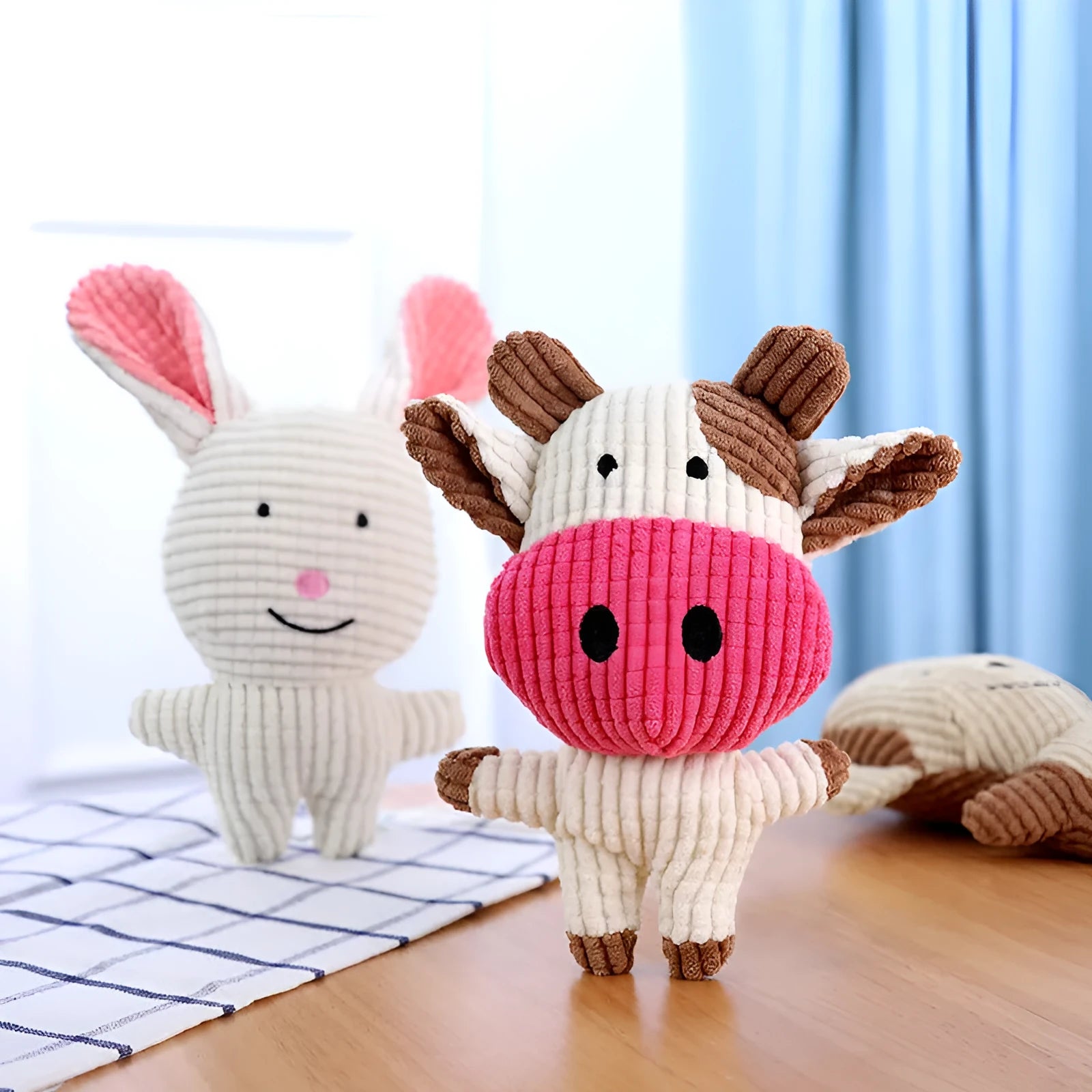 Animal shape plush dog chew toy in multiple colours with bite resistant construction
