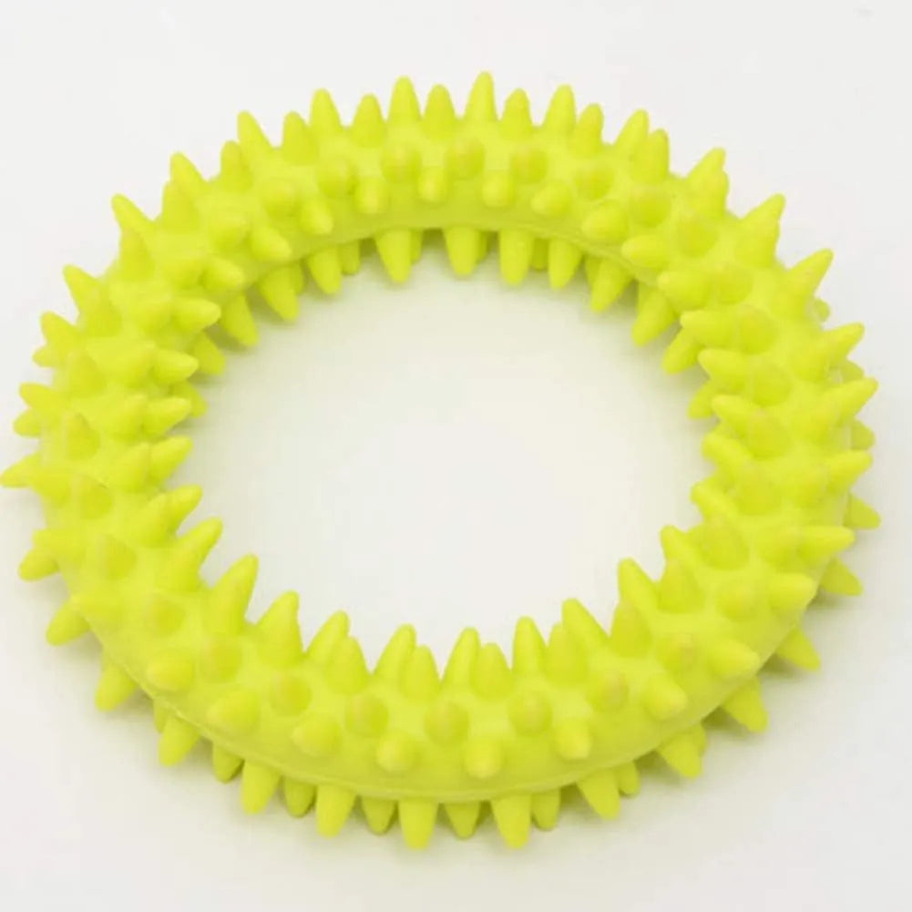Blue TPR spiky circle dog chew toy on a white background showing dental nubs and ring shape.