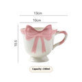 Ceramic mug with heart and bow design in Black Pink colour, showing 301-400ml capacity.
