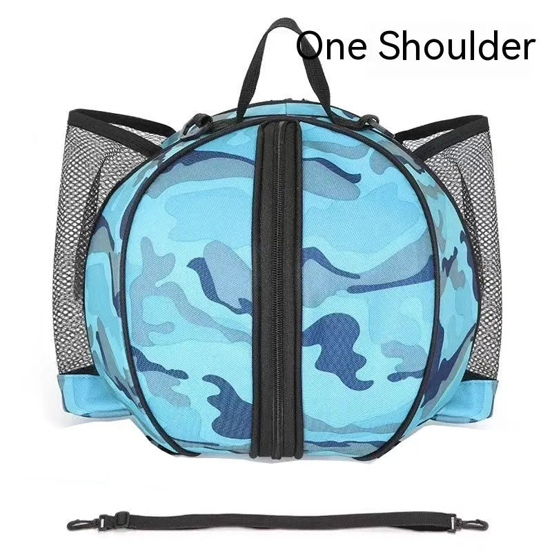 Black Oxford cloth basketball bag with one shoulder strap, shown next to a basketball.