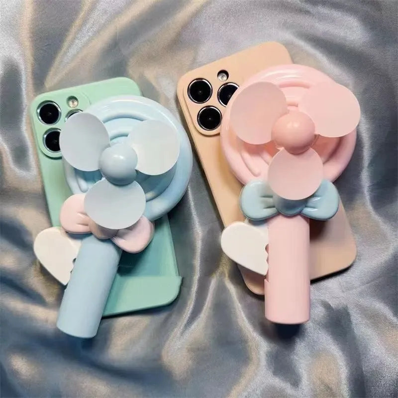 Cyan soft shell lollipop hand fan TPU phone case for iPhone 15 Pro Max with drop-resistant design