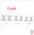 S925 sterling silver geometric flower stud earrings with crystal petals in gold or platinum finish.