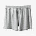 Men's solid colour cotton boxer shorts with a high waistband and loose leg.