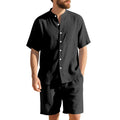 Men's light blue linen blend two-piece suit with short sleeve shirt jacket and shorts on a hanger.