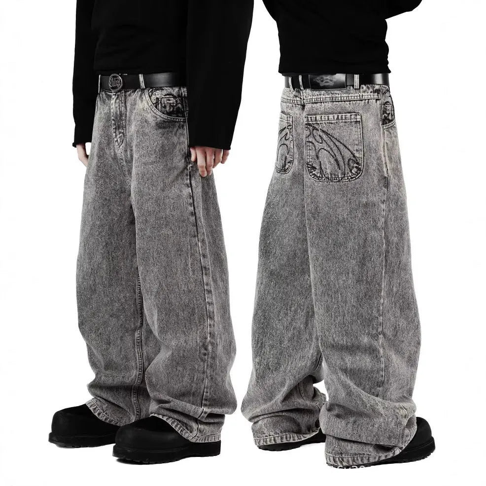 Grey loose straight-leg cotton denim trousers on mid-waist