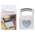 Stainless steel potato wave knife kitchen tool on a wooden surface.