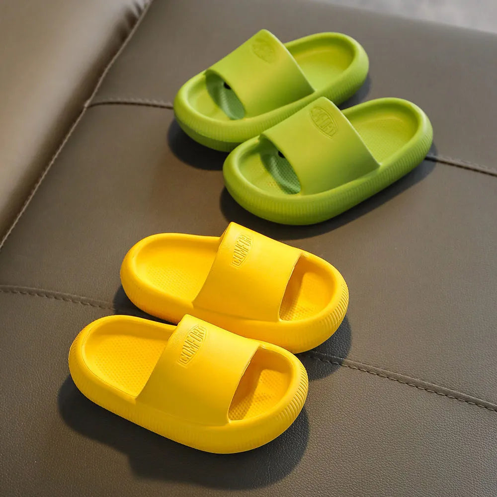Children's colourful EVA slippers showing non-slip sole, available in blue, green, orange, pink, and yellow.