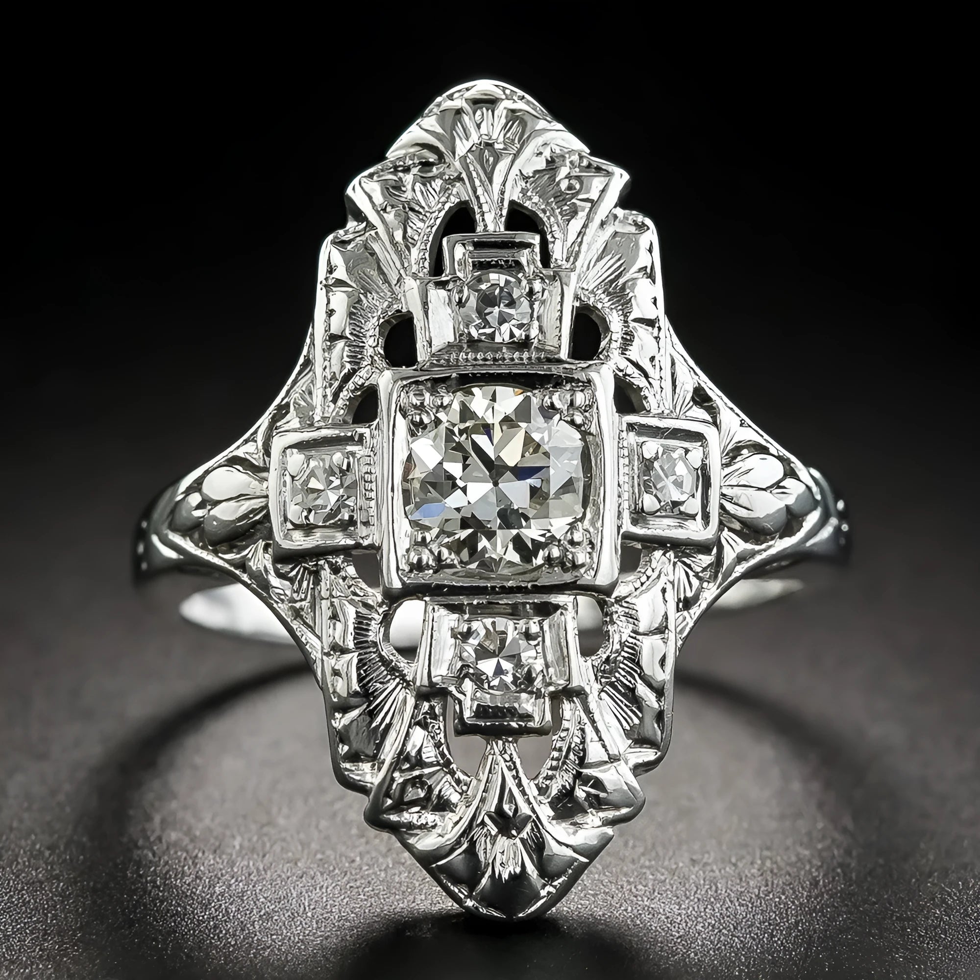 Geometric hollow-out copper ring with electroplated silver finish and diamond studs