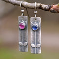 Antique finish red sapphire earrings with geometric shape and ellipse elements in retro style