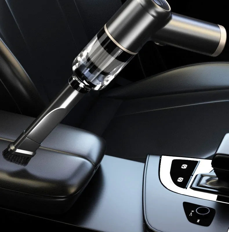 Black wireless handheld car vacuum cleaner with multiple nozzle attachments on display