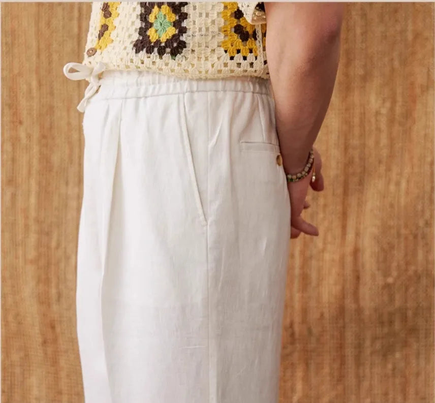 Women's straight-leg linen trousers in greige with an elasticated high waistband.