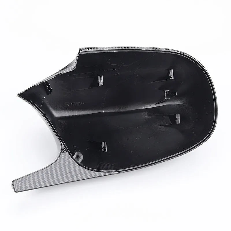 Pair of BMW 3 Series E90 ABS plastic rearview mirror housings in black and carbon pattern finishes
