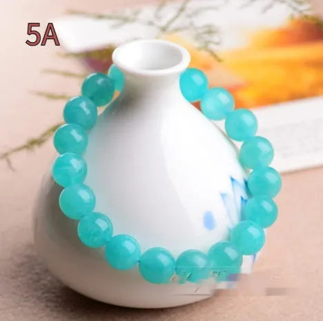 Natural Amazonite scattered beads bracelet with polished finish in ice blue-green colour