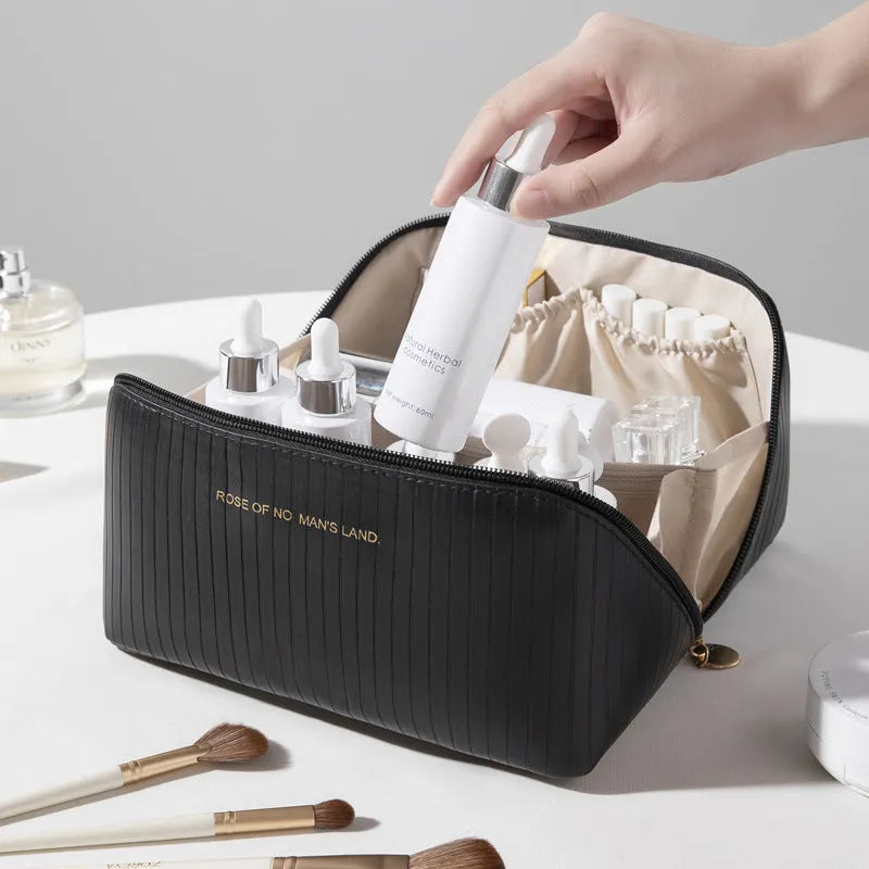 Vertical pattern pillow makeup bag showing cubic 22.5cm design with travel storage capacity